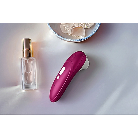 Бесконтактный розовый клиторальный стимулятор Womanizer Pro